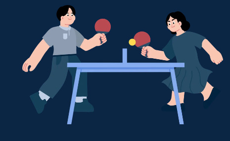 Two people playing table tennis